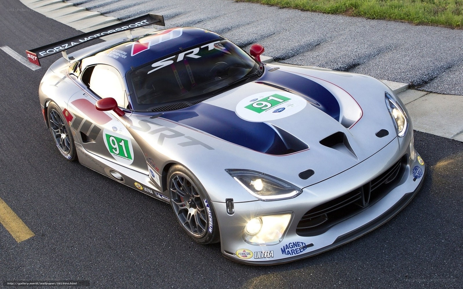 silver race car on track