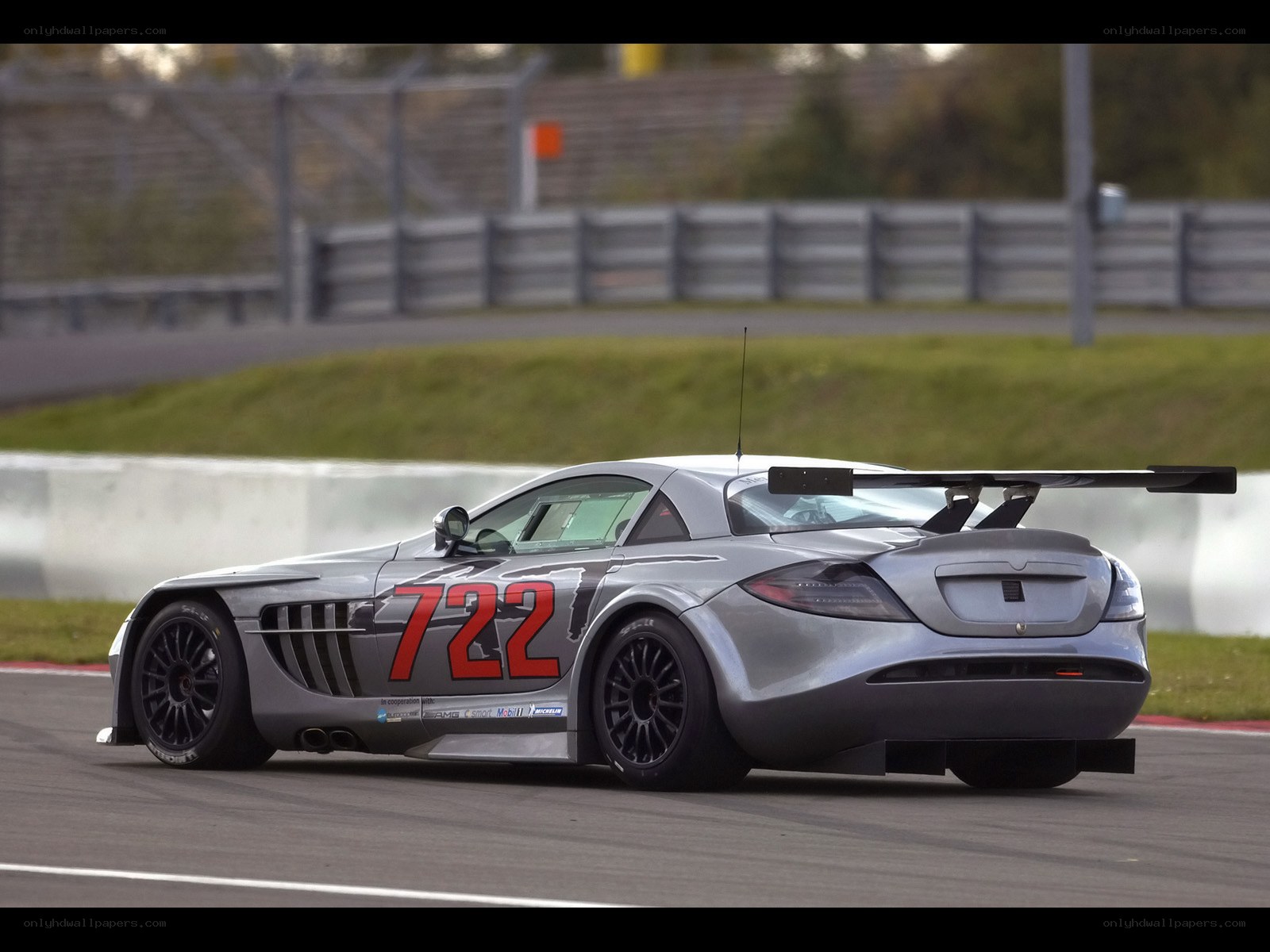 silver race car on track