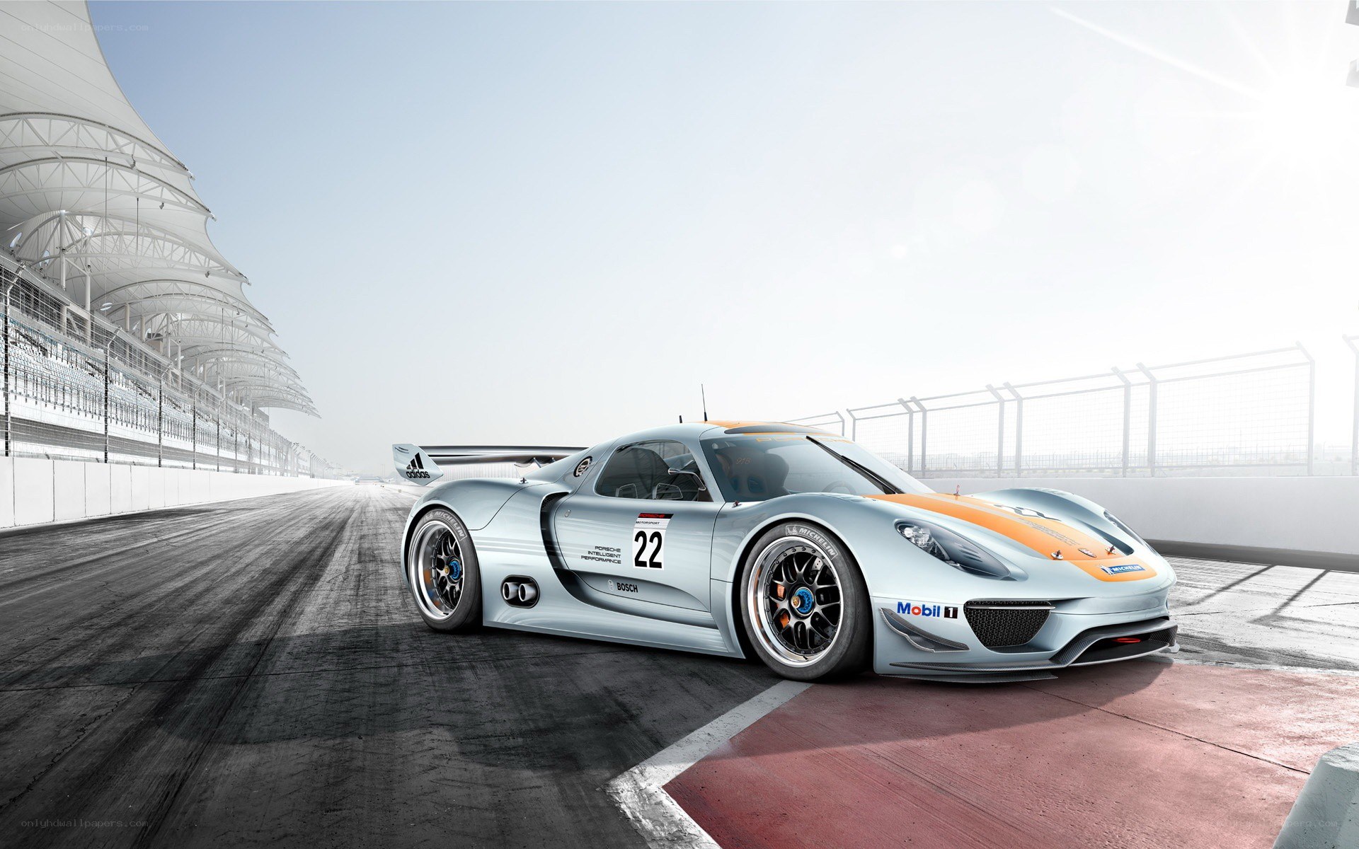 Silver race car on track