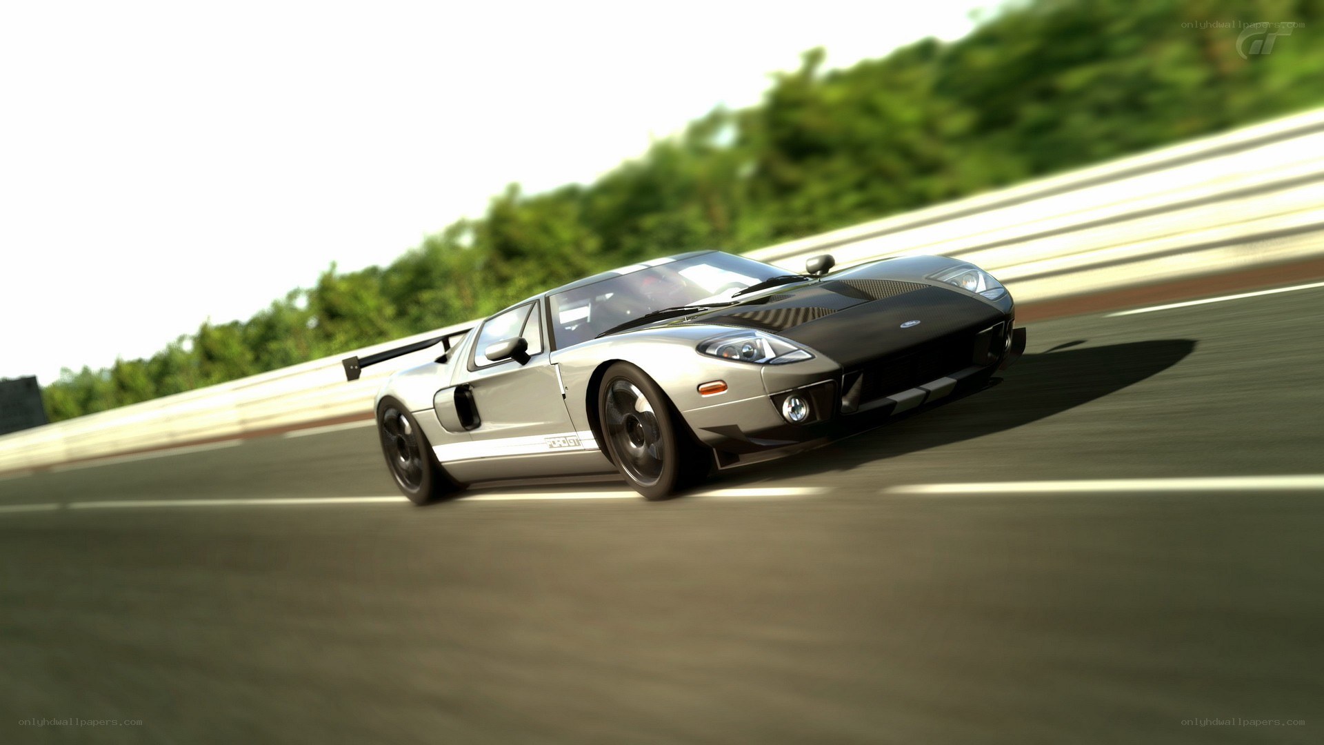 silver race car on track
