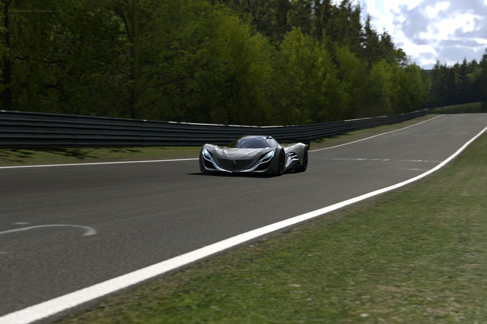 Silver race car on track