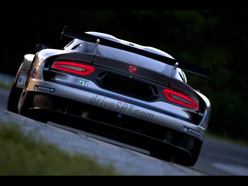 silver race car on track
