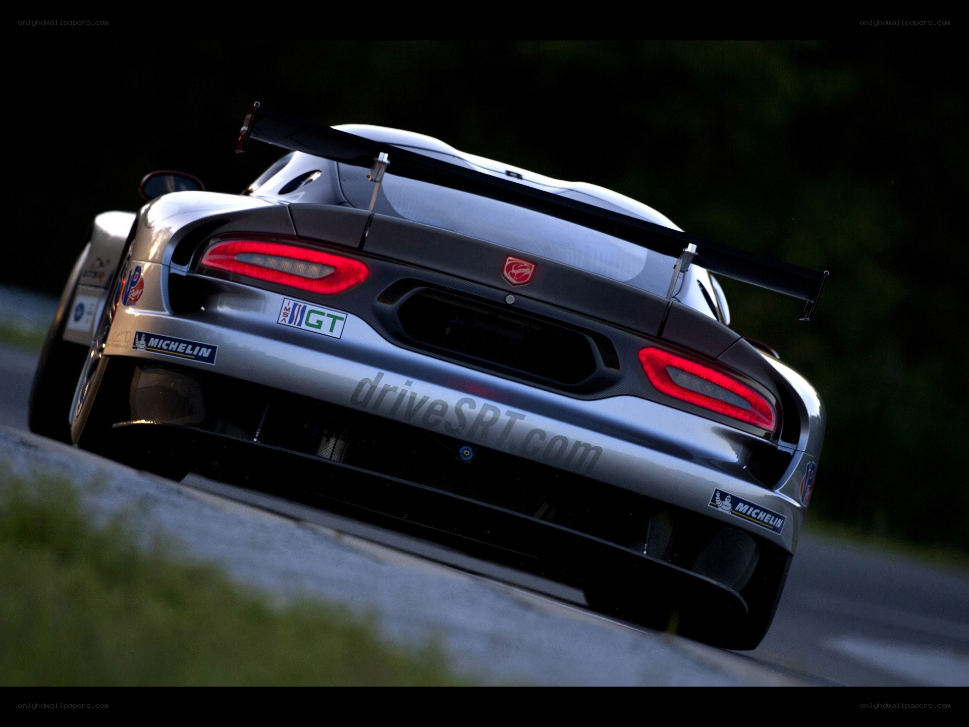 silver race car on track