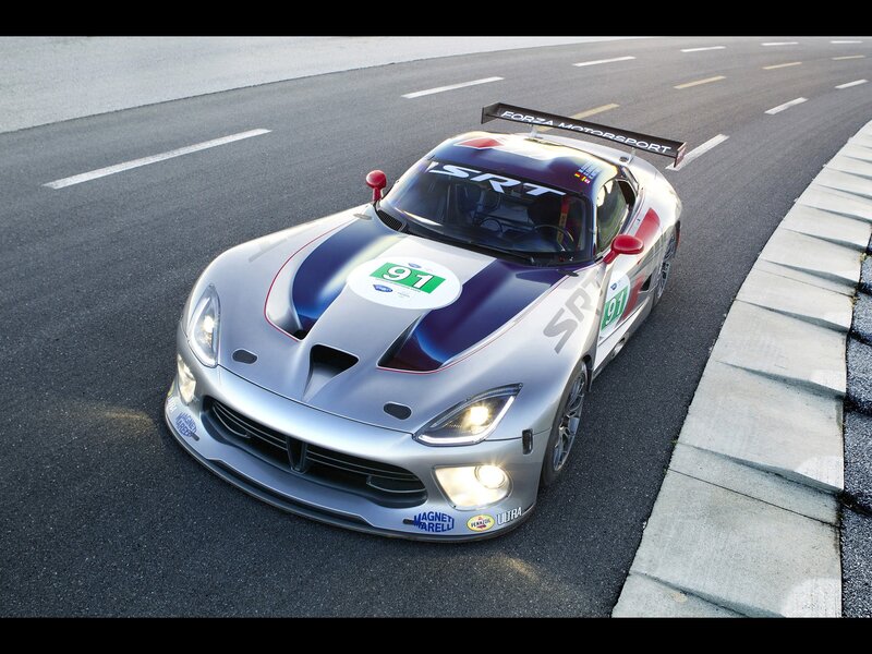 Silver race car on track