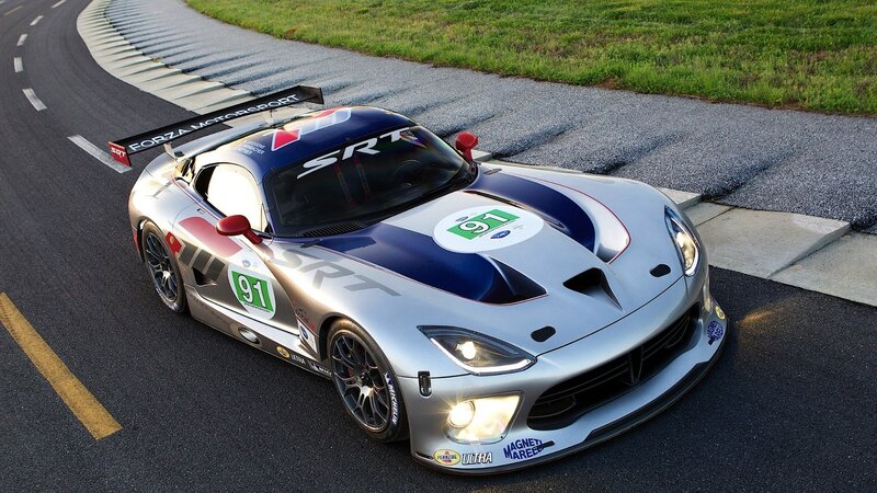 Silver race car on track
