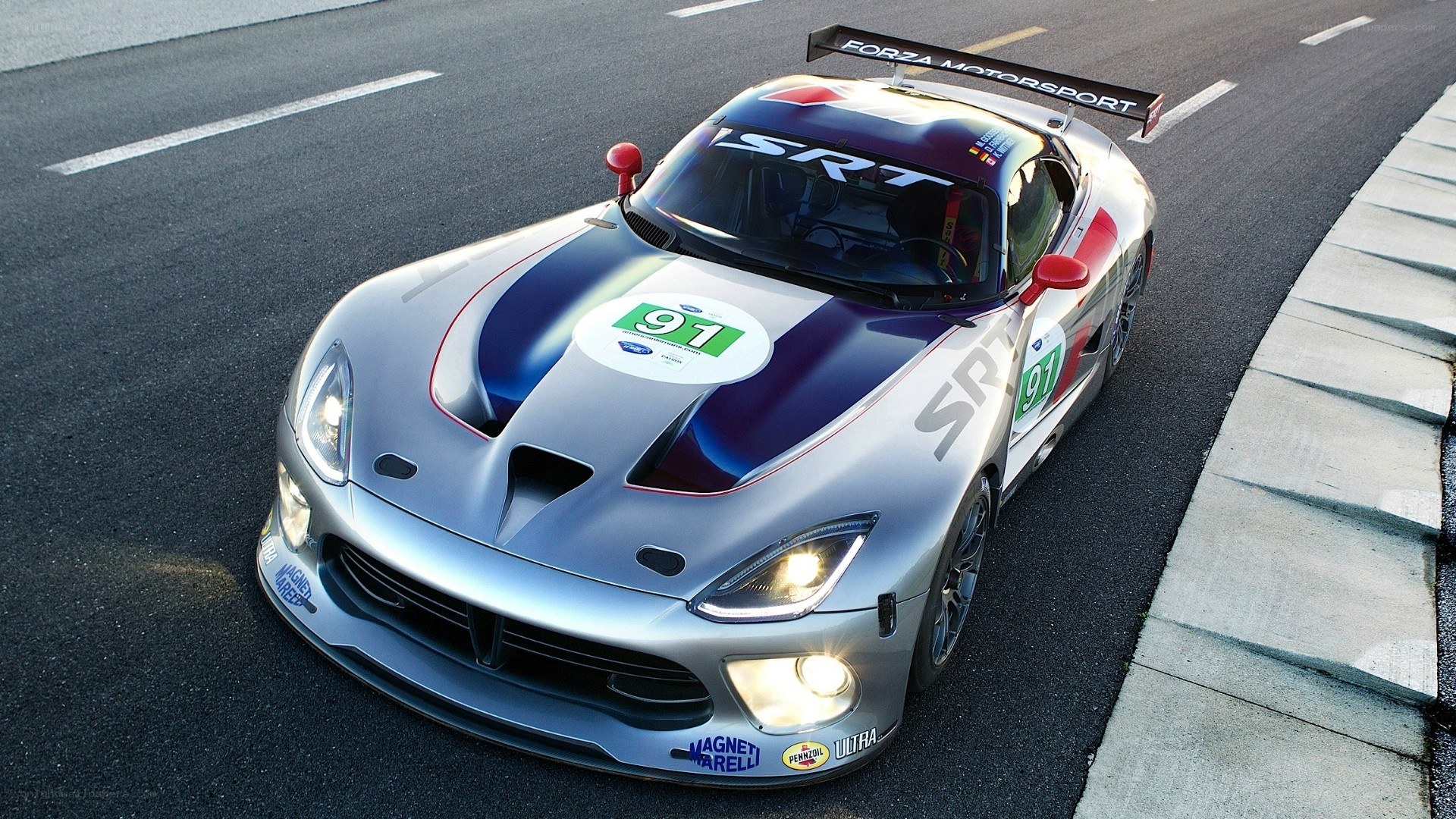 silver race car on track
