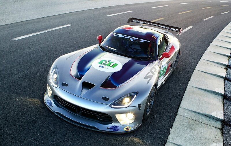 Silver race car on track