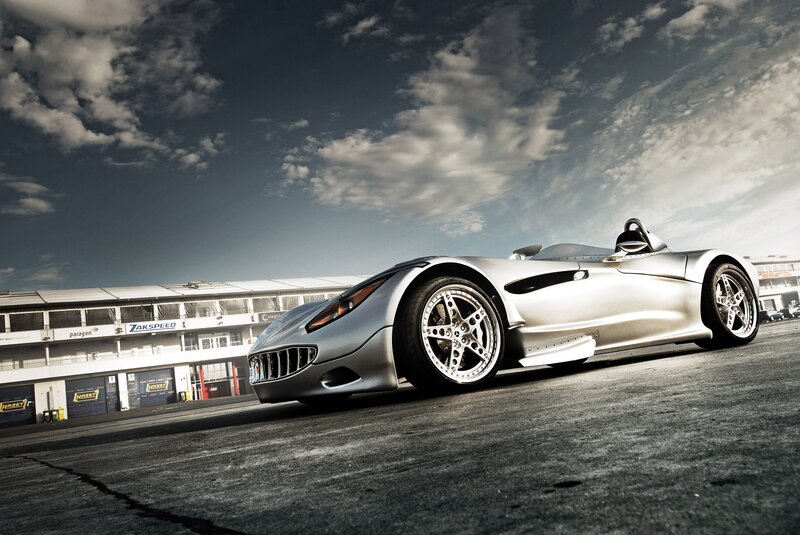 silver race car on track
