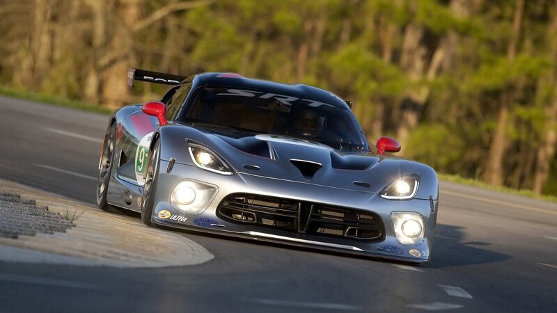 silver race car on track