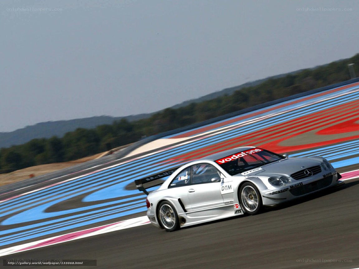 silver race car on track