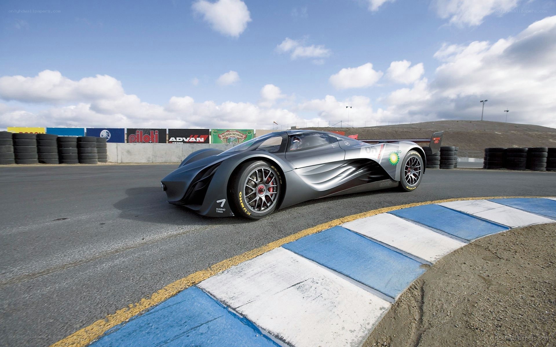 Silver race car on track