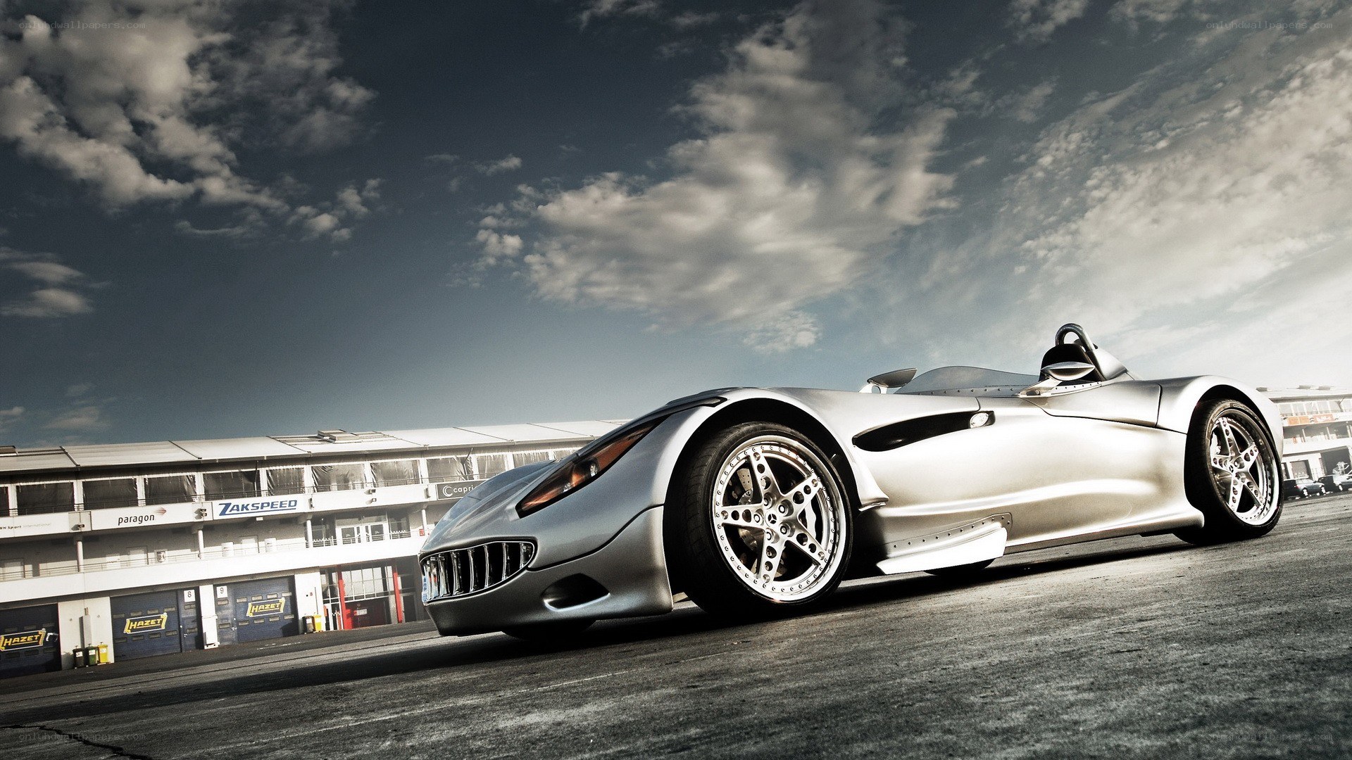 silver race car on track