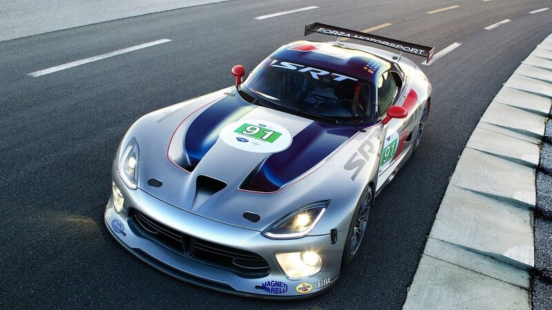 silver race car on track