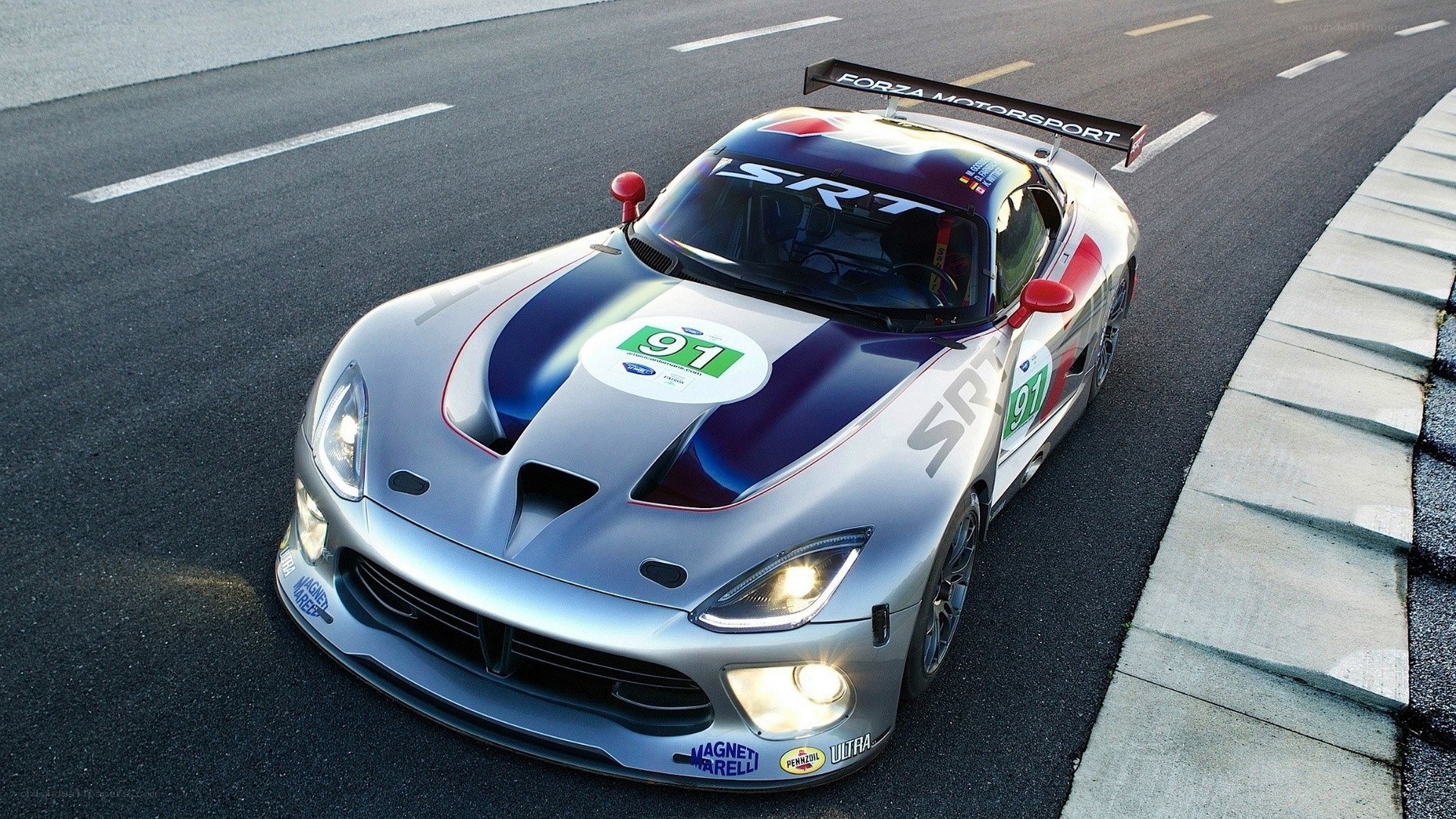 silver race car on track