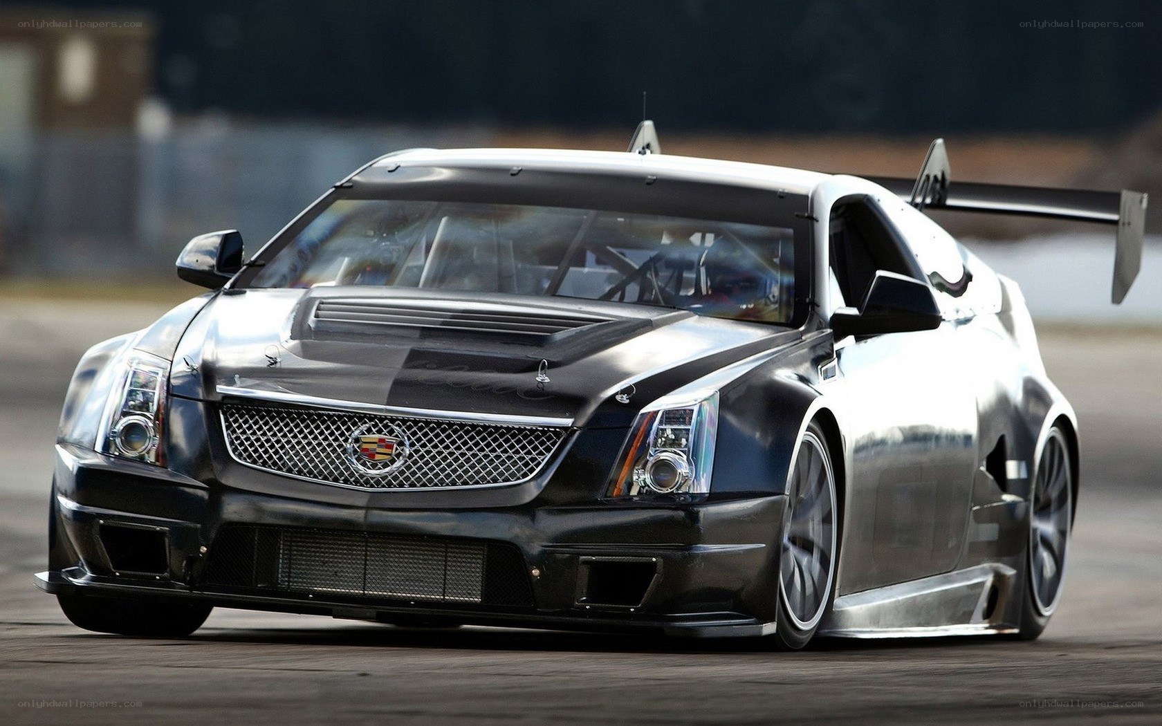 silver race car on track