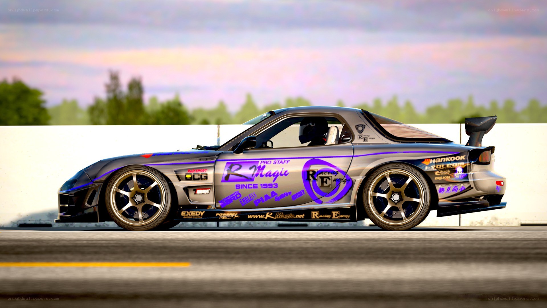 silver race car on track