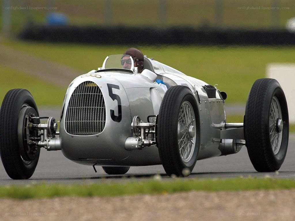 Silver race car on track