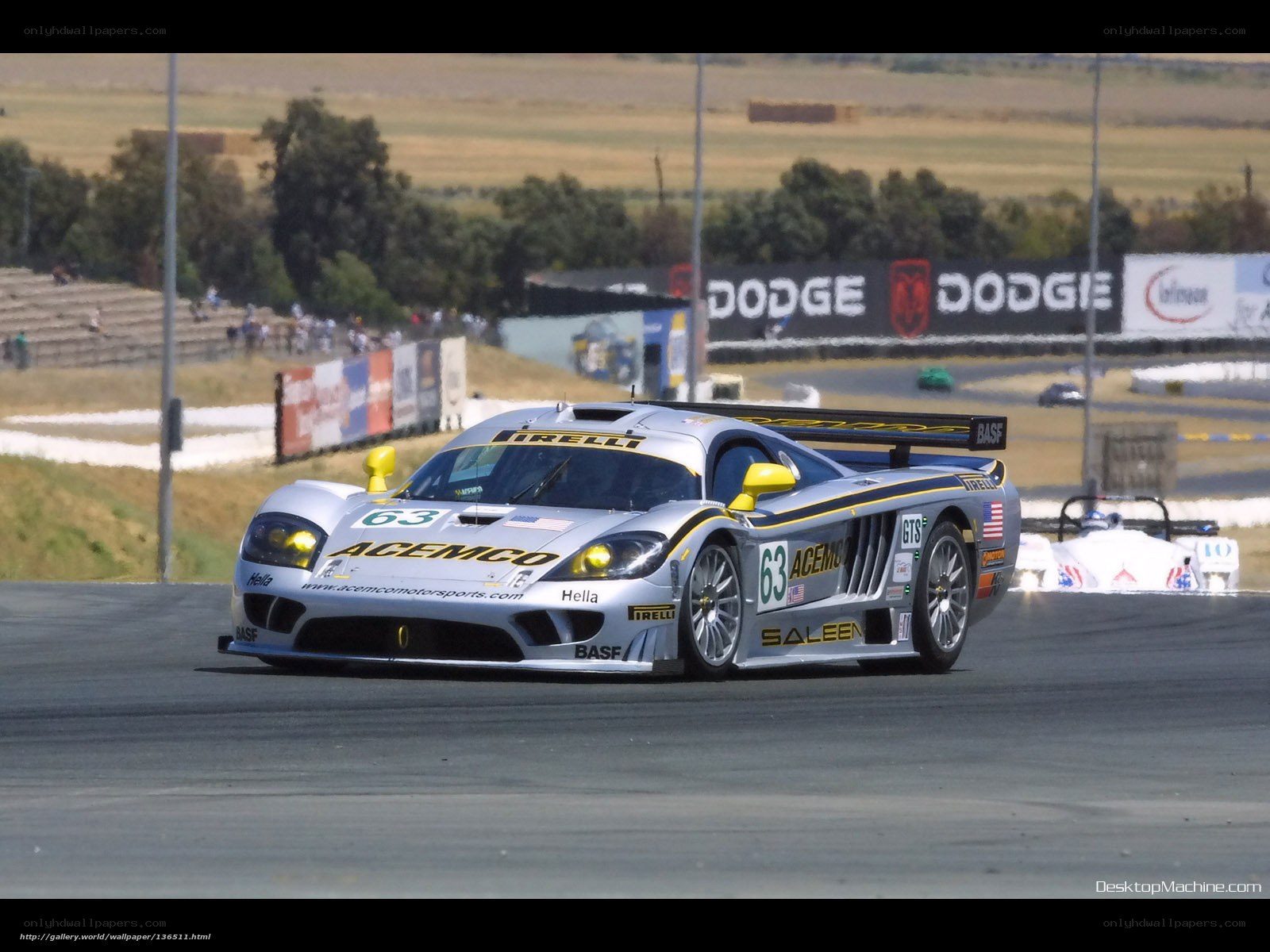 Silver race car on track