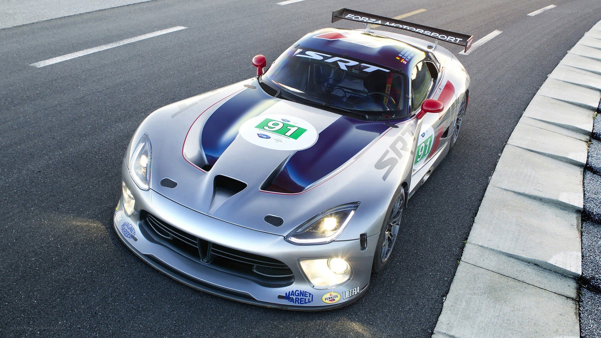 Silver race car on track
