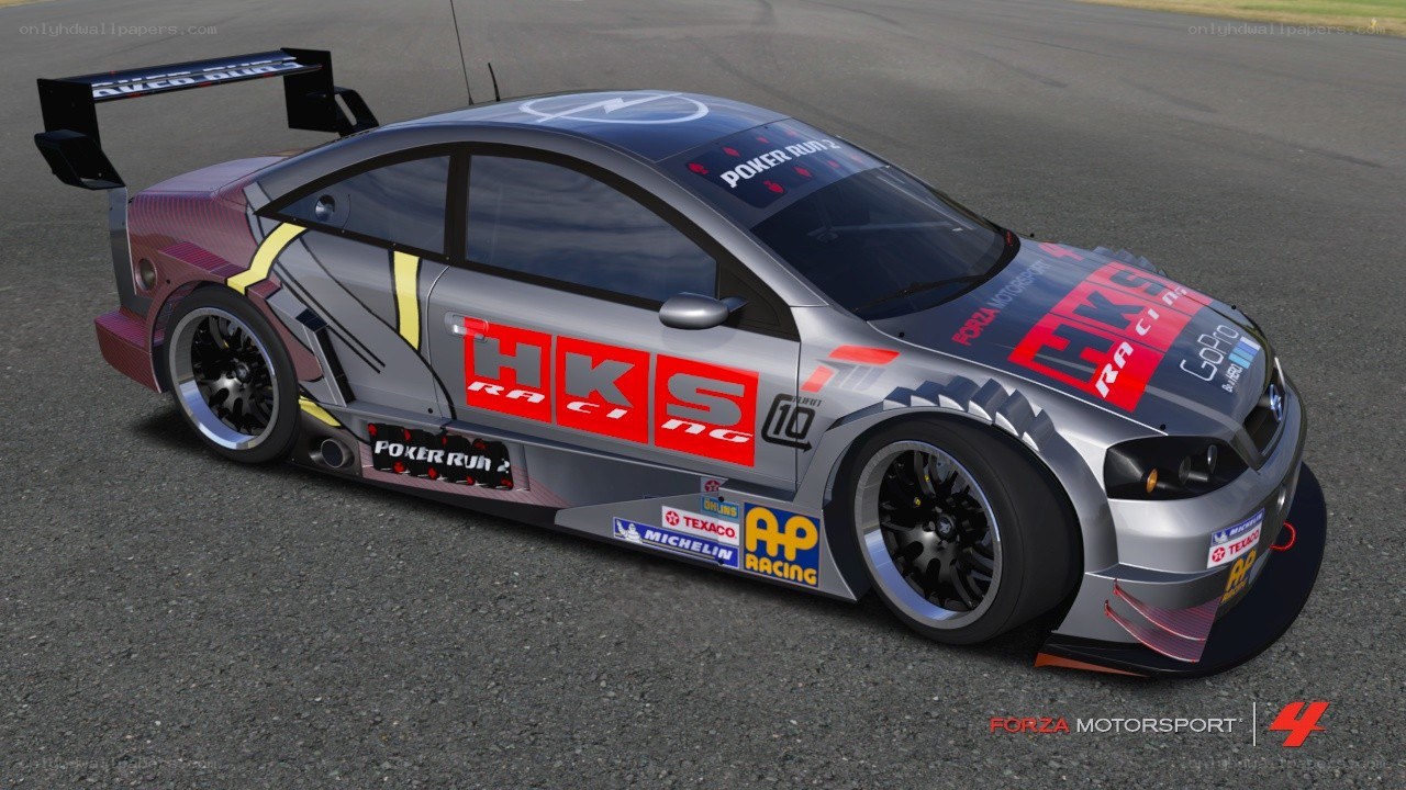 silver race car on track