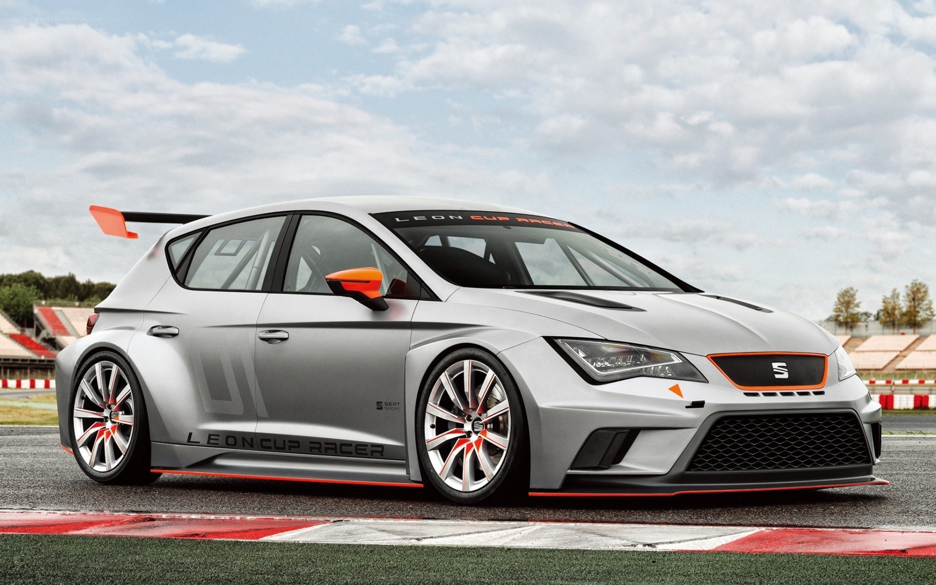 Silver race car on track