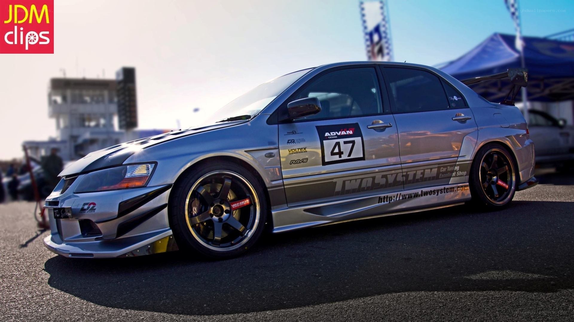silver race car on track