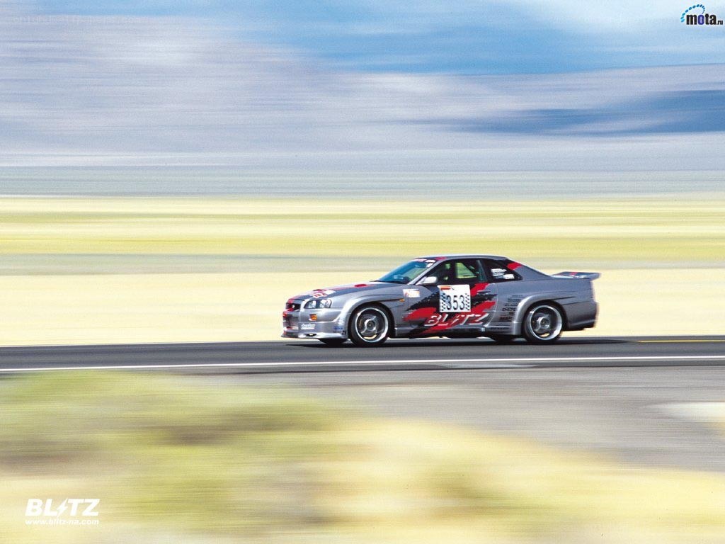 silver race car on track