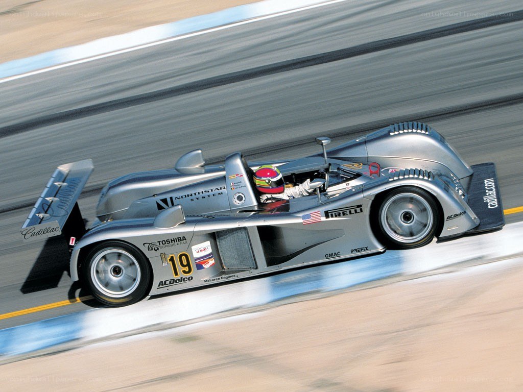 silver race car on track