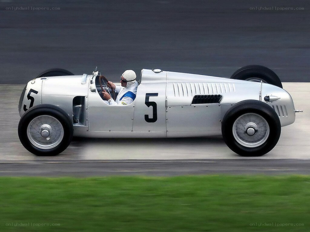 Silver race car on track