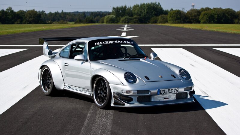 silver race car on track