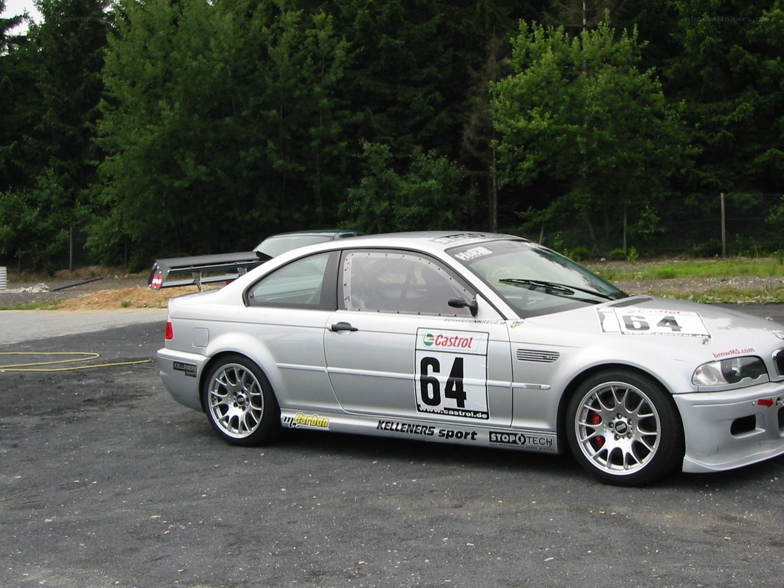 silver race car on track