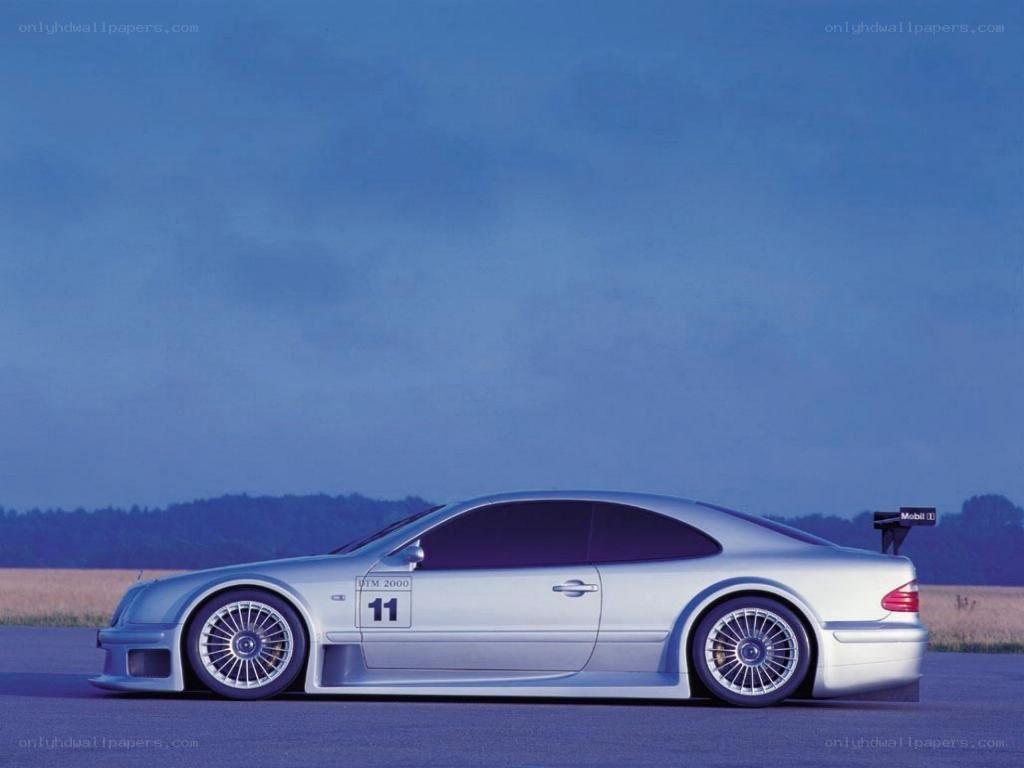 silver race car on track
