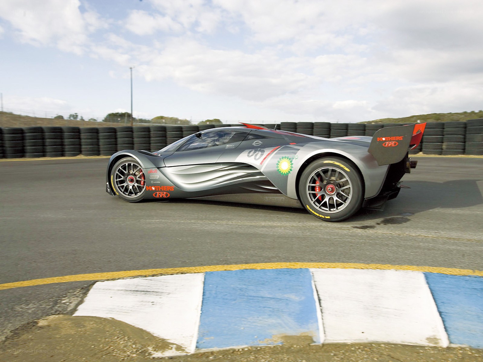 Silver race car on track