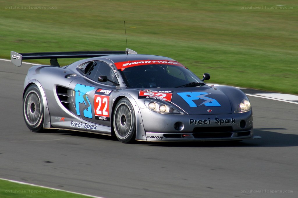 silver race car on track