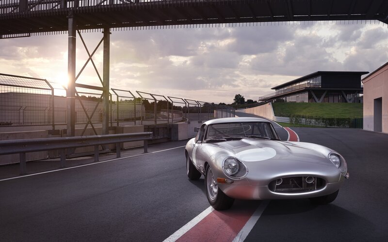 Silver Race Car on Track — Dramatic, Sunset