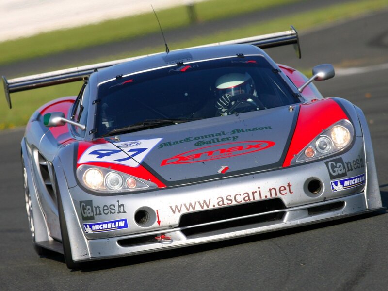 Silver Race Car on Track — Dynamic, Afternoon, Photograph, Driver, Racing Number