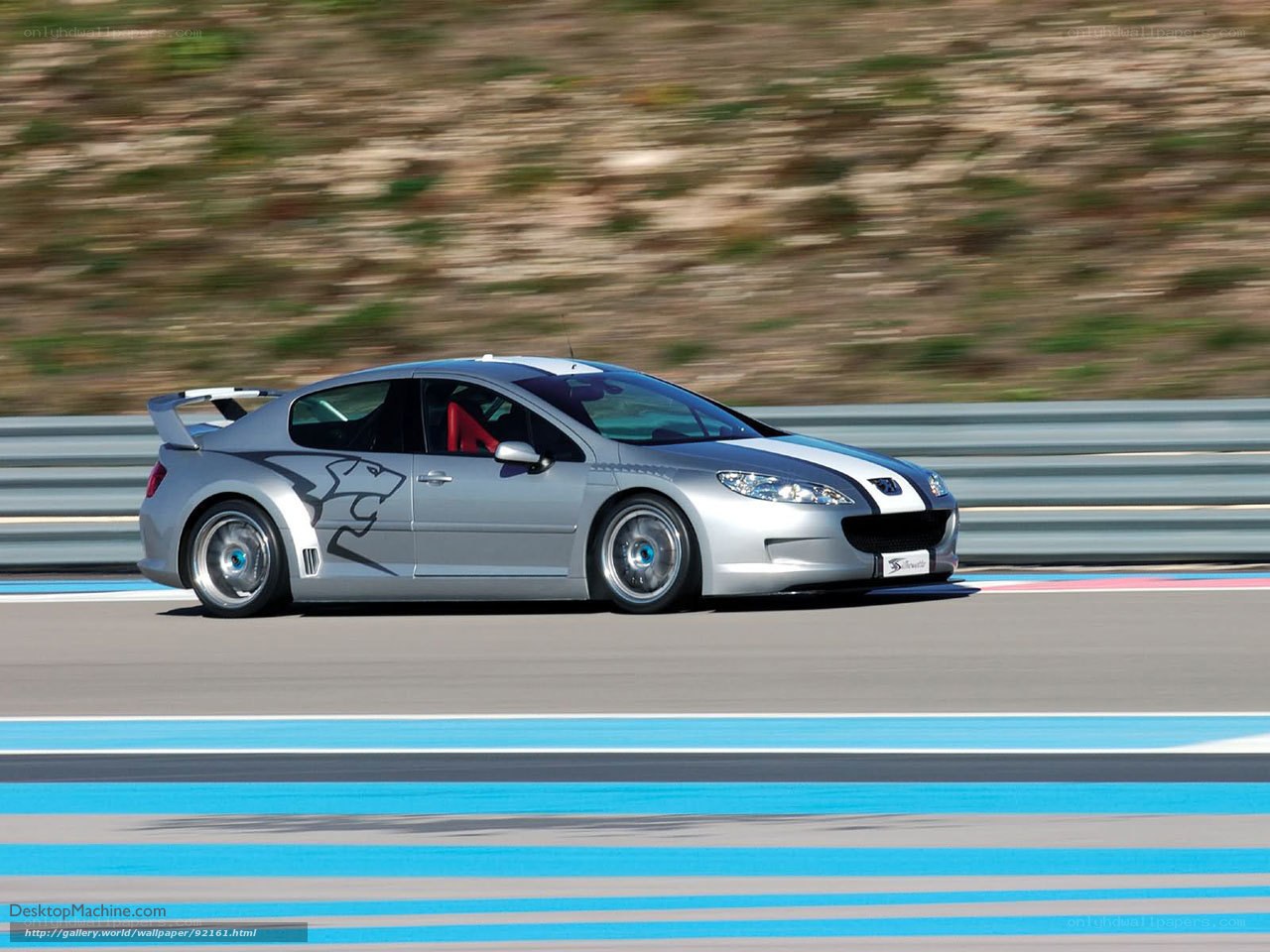 silver race car on track