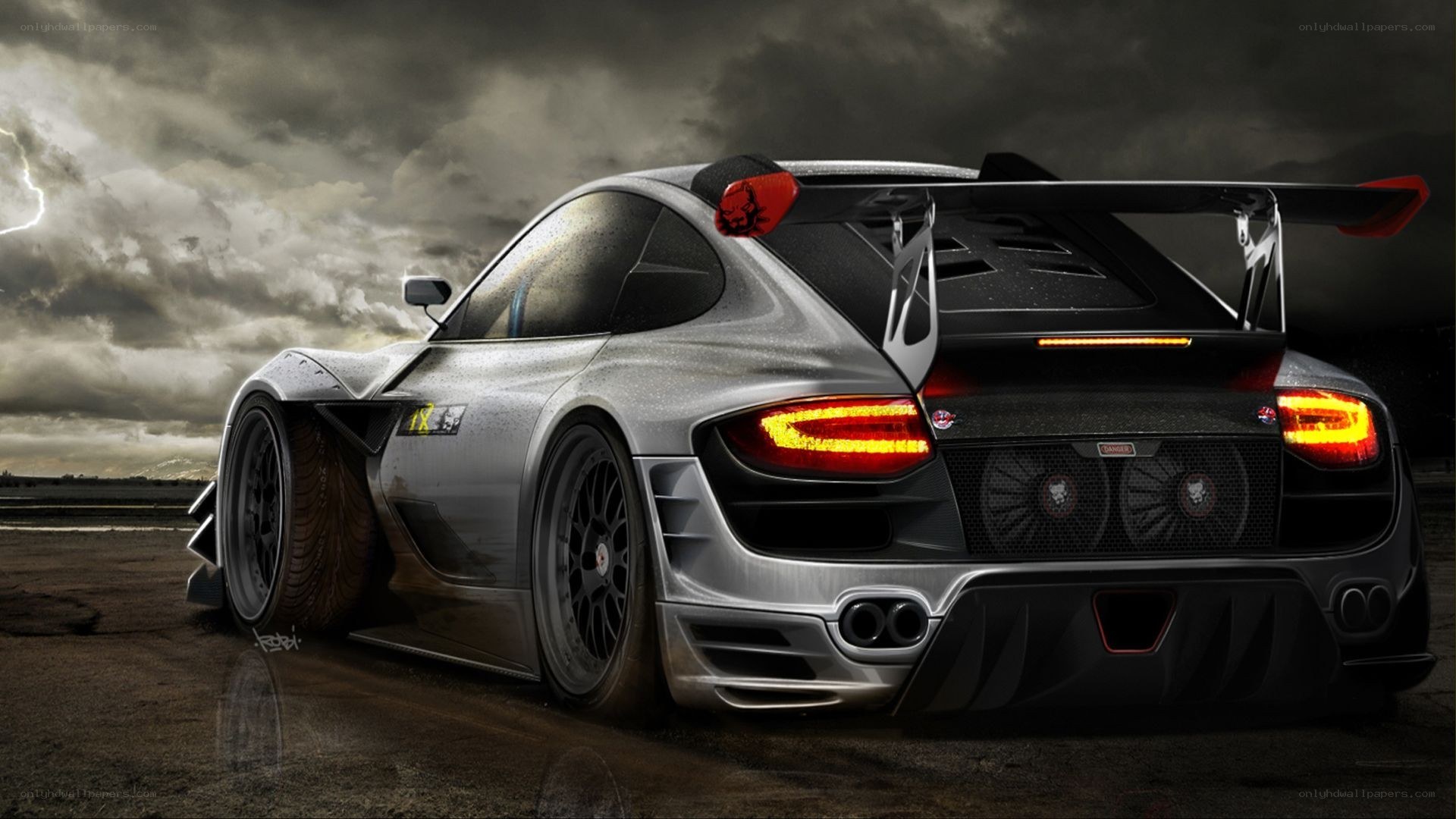 silver race car on wet track
