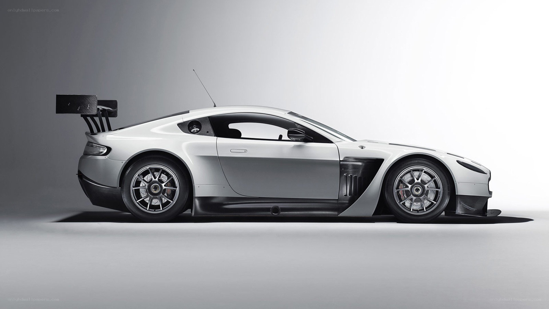 silver race car side profile