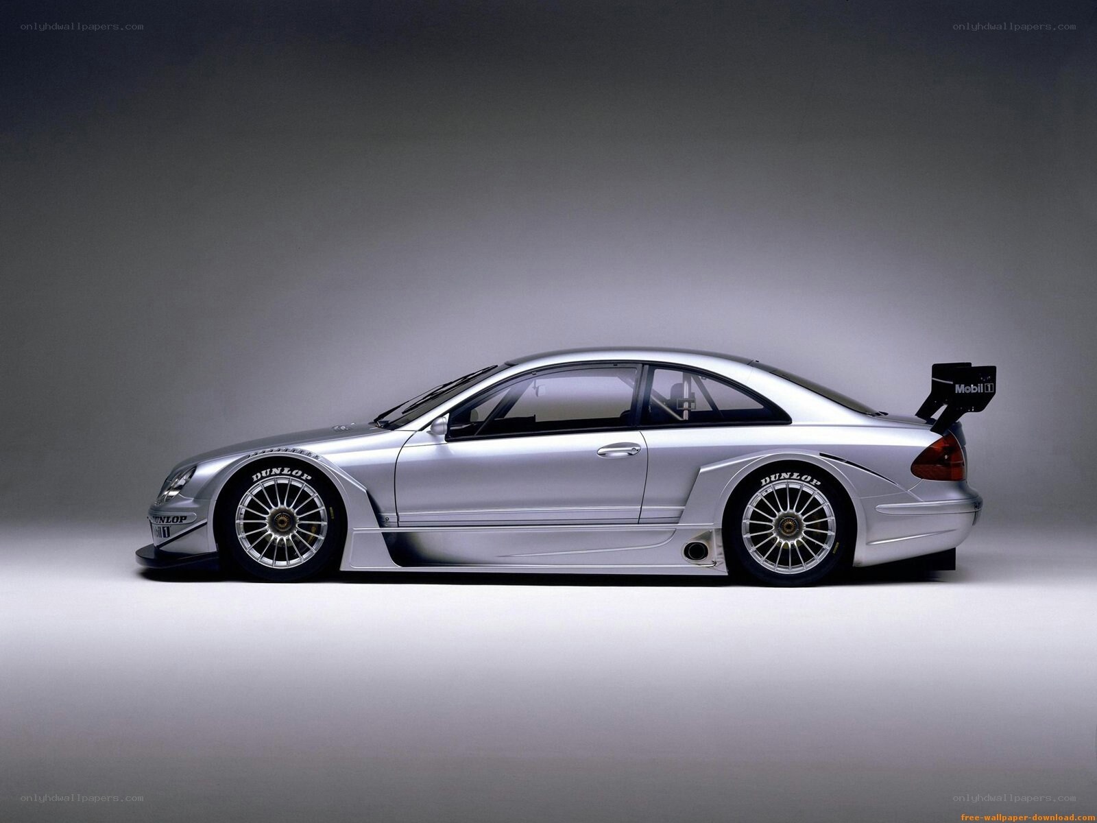 silver race car side view