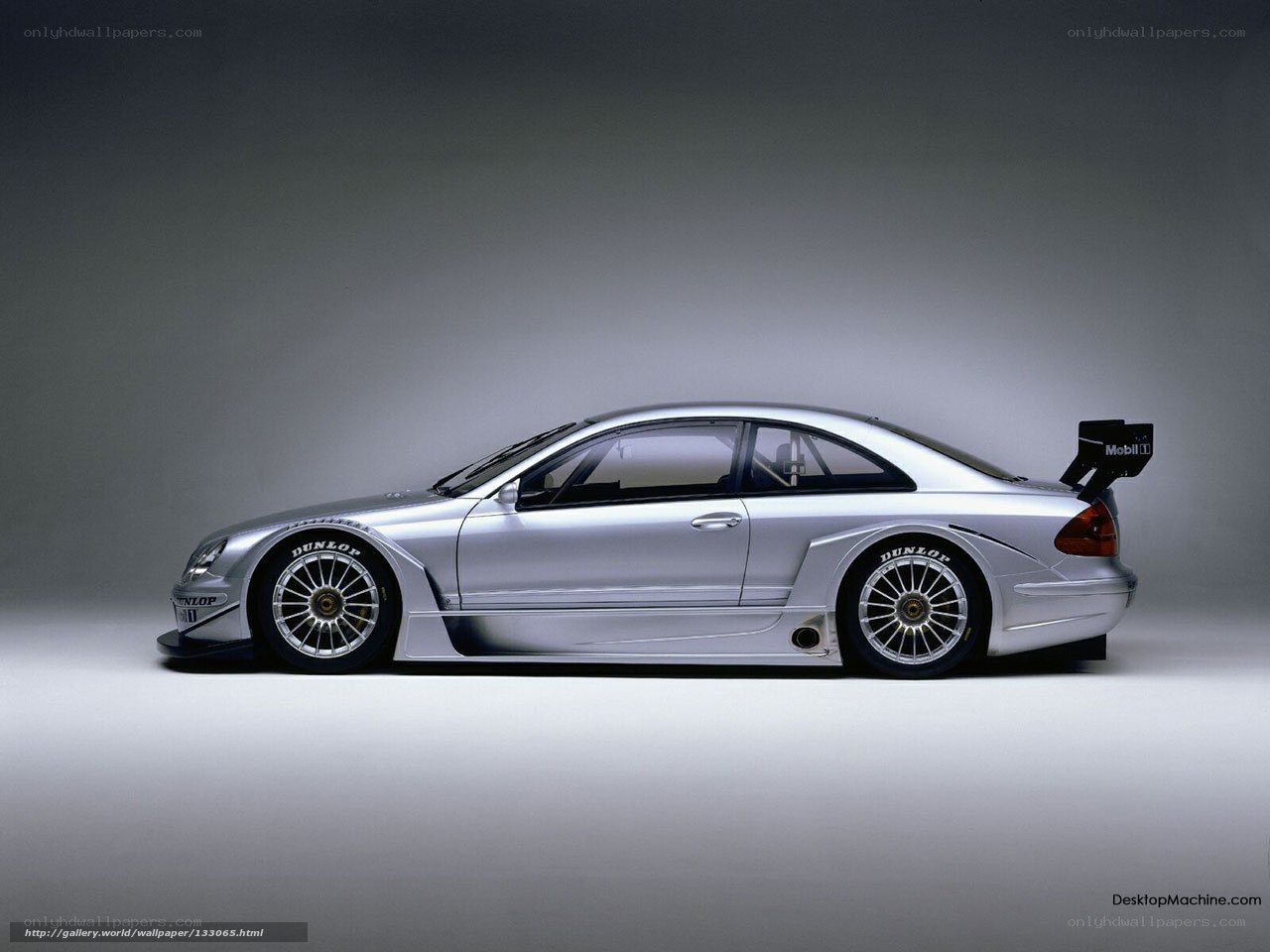 silver race car side view