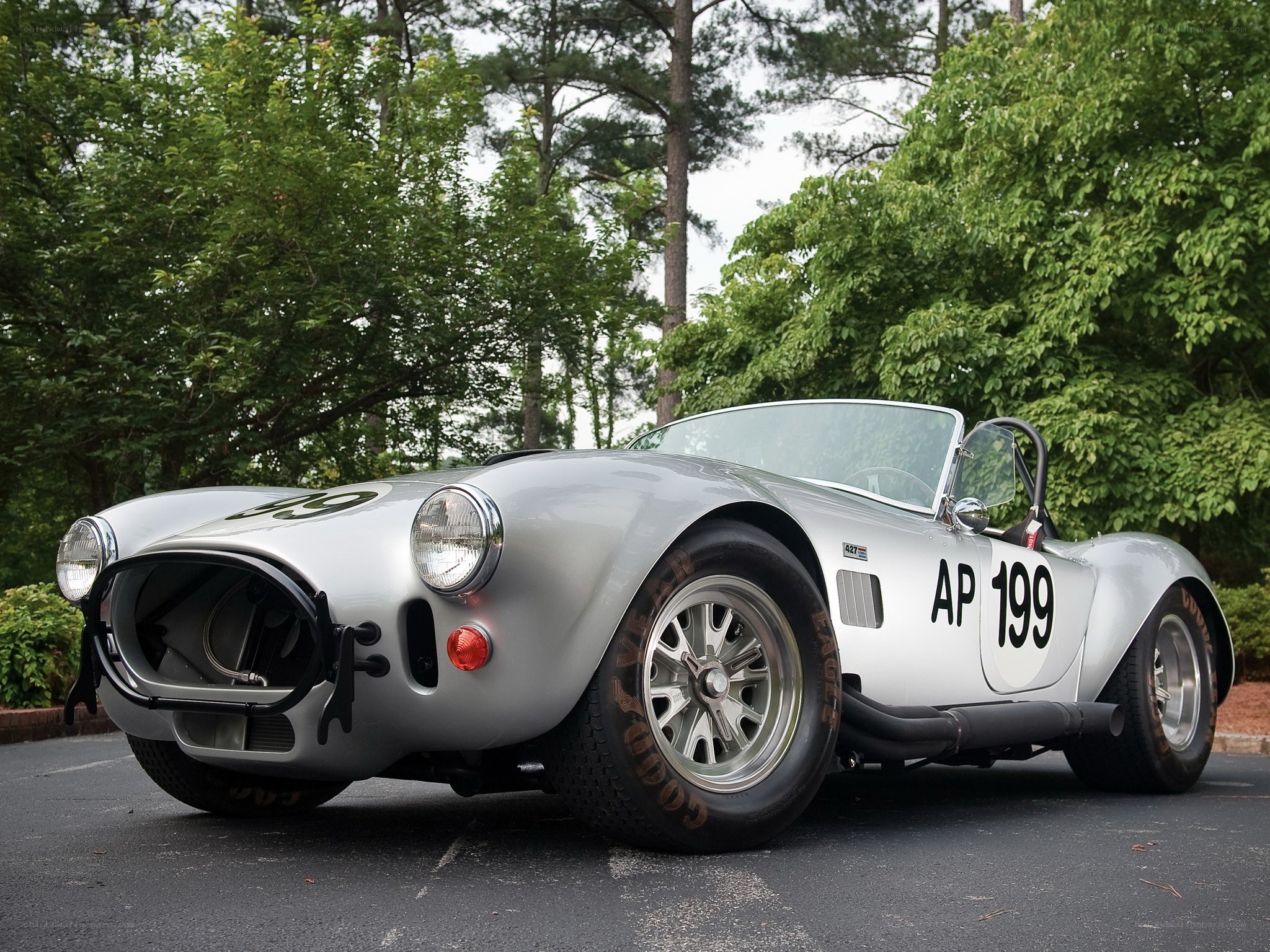 silver race car with number 199