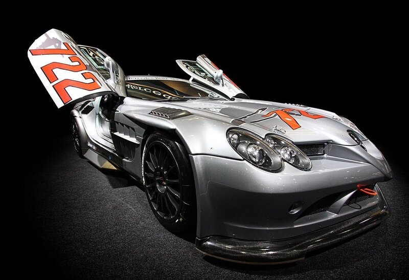 Silver race car with open doors