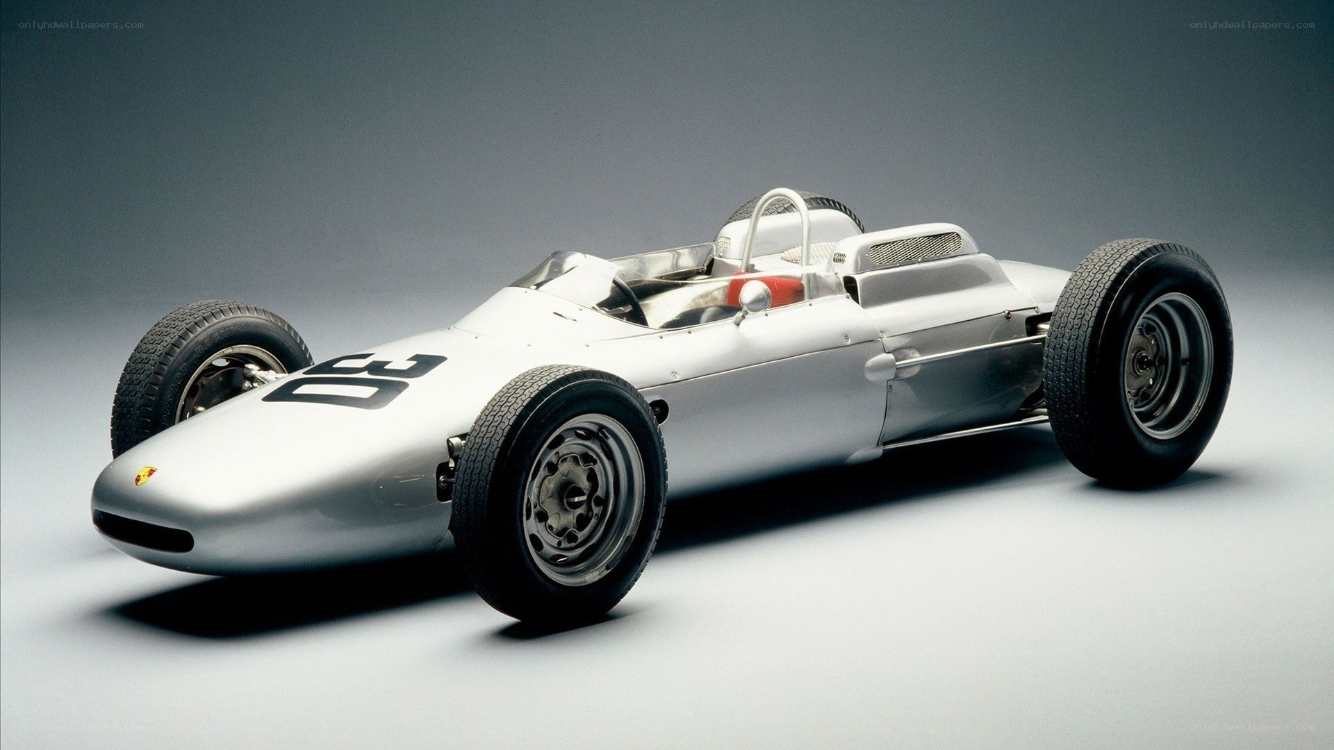 Silver racing car with number 30