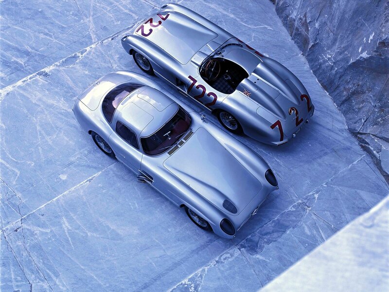 Silver racing cars on ice