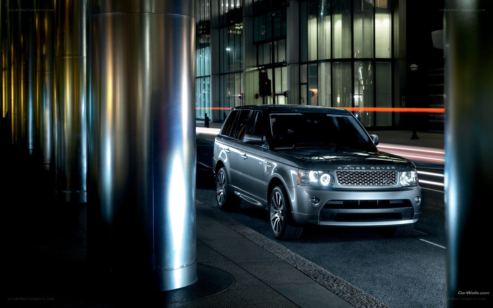 Silver Range Rover at night