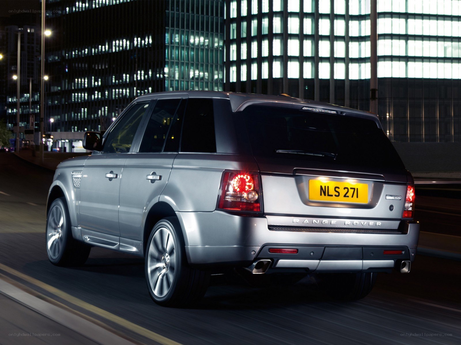 Silver Range Rover at night