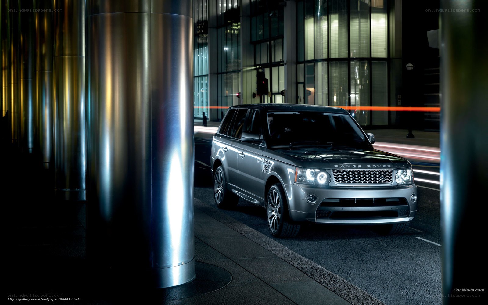 Silver Range Rover at night