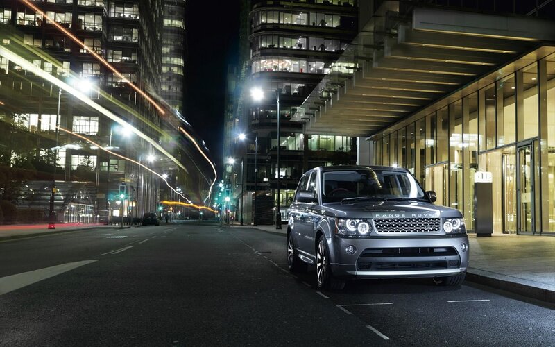 Silver Range Rover at night