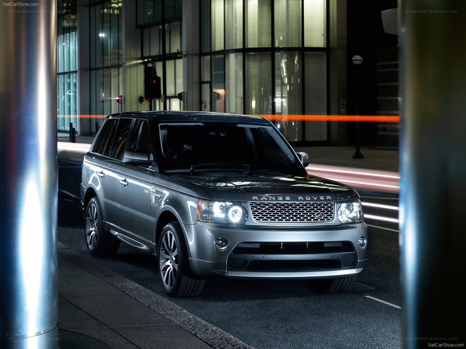 Silver Range Rover at night